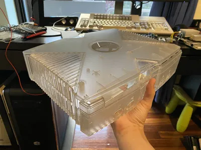 Crystal Xbox shell being held